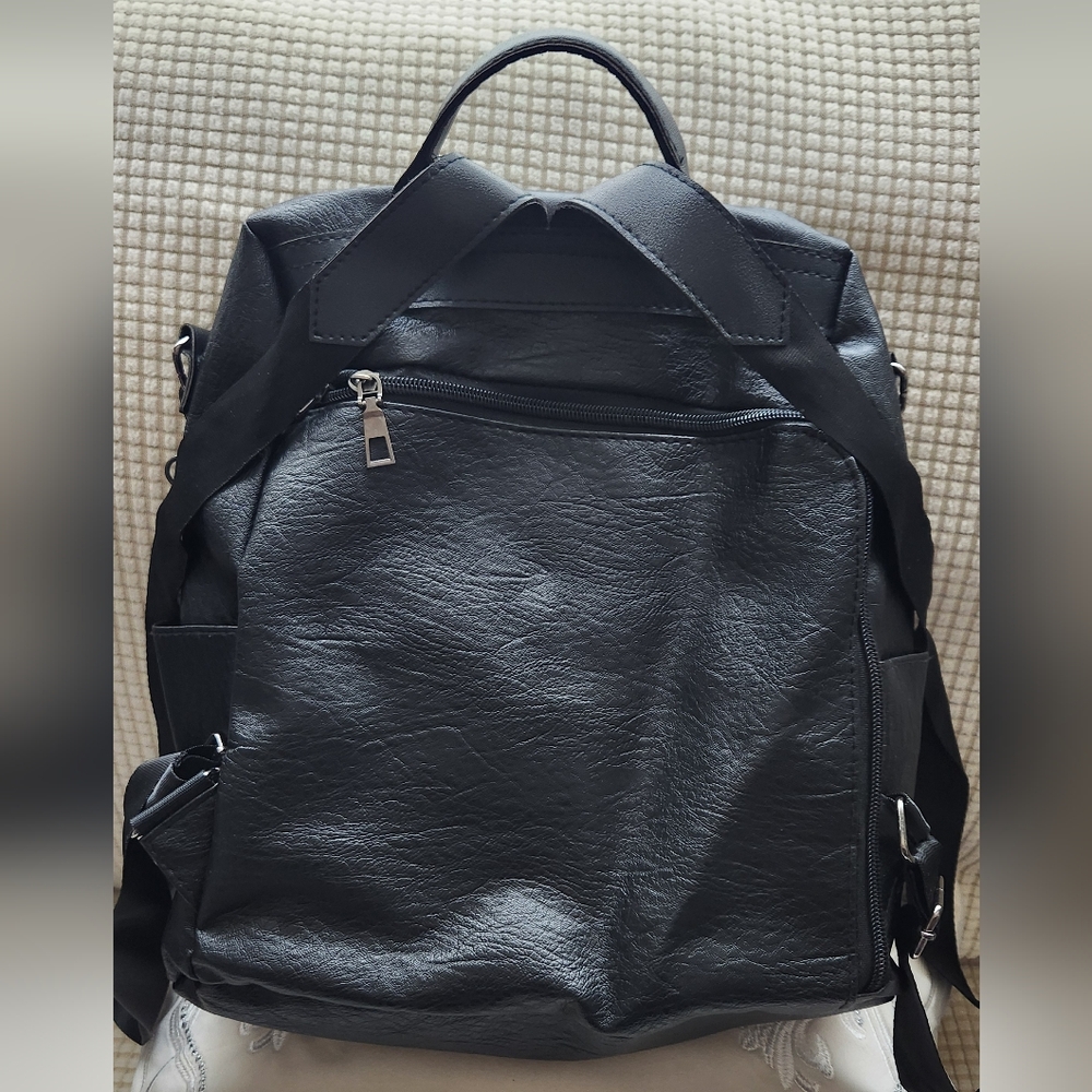 Spacious anti theft backpack or handbag.